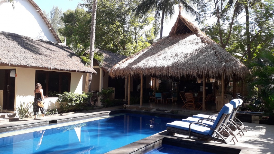 Beautiful resort in coconut palm grove, Gili Trawangan, Lombok